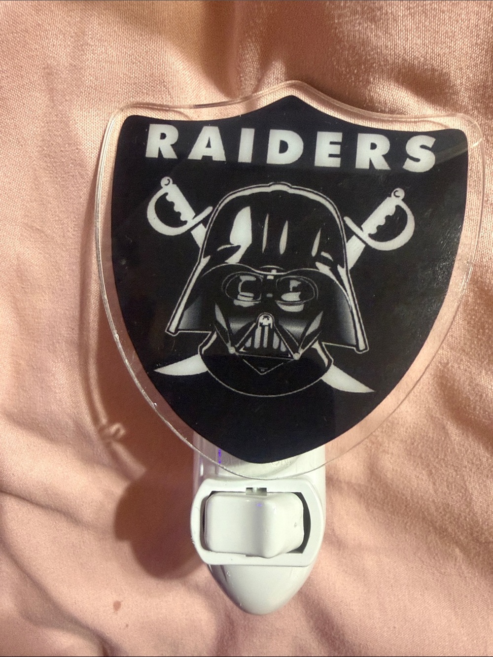 Raiders plug in night light